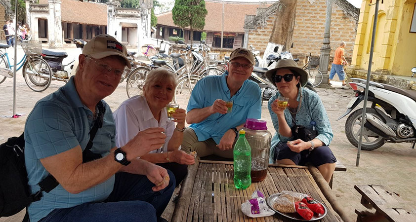 Tourists enjoy local food and drink during their visit to Mia Pagoda