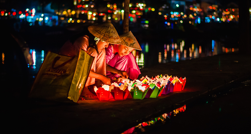 Lanterns in full colors are floated at night