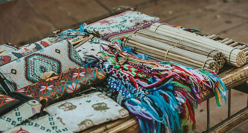 Woven items with natural inspiration are presented in the market