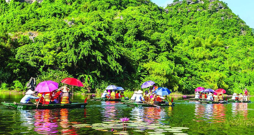 Sailing along Perfume river to reach Perfume pagoda