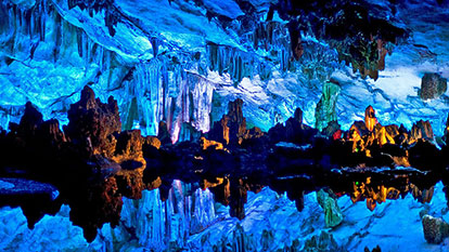 Admiring sparkling beauty of Surprise Cave in Halong Bay Vietnam