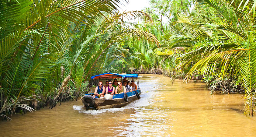 Take a boat for a cruise on the Mekong River