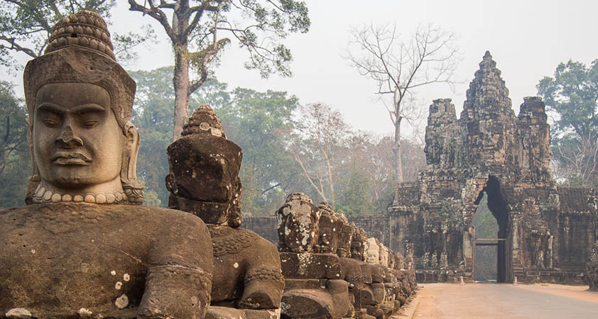 Demons statues in the South Gate of Angkor Thom 