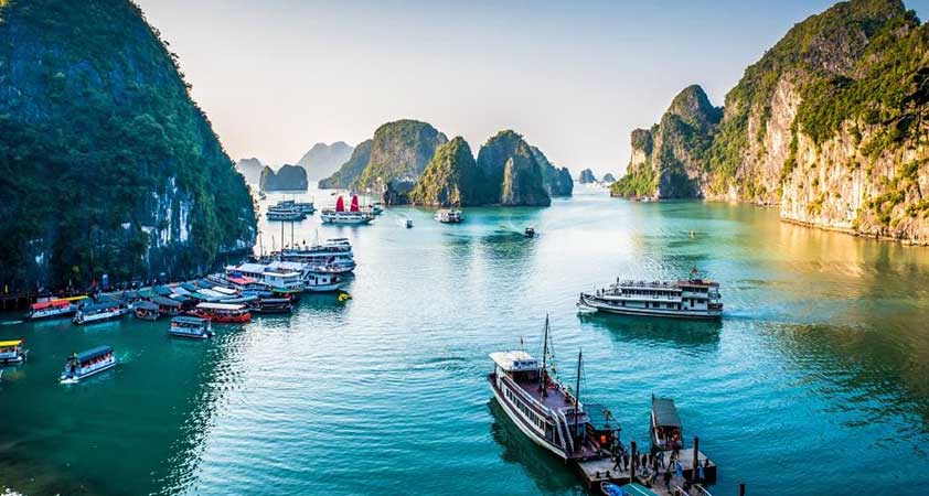  A cruise among the rocky limestone islands in the emerald waters of Halong Bay
