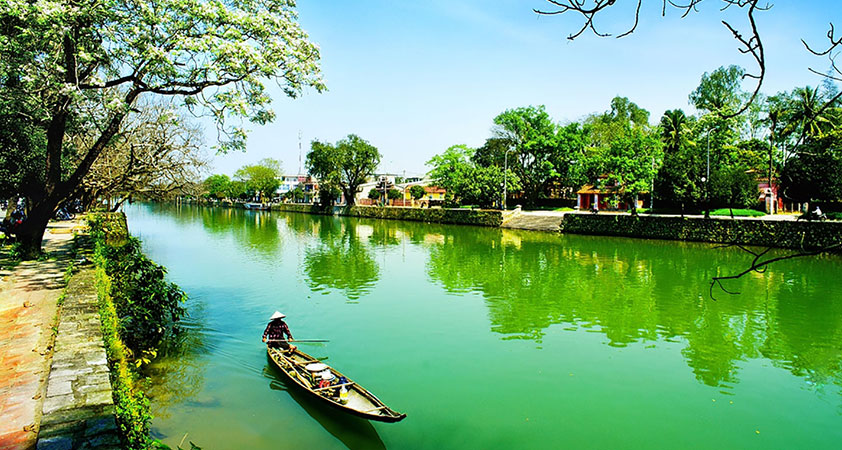Take a boat trip on the Huong River