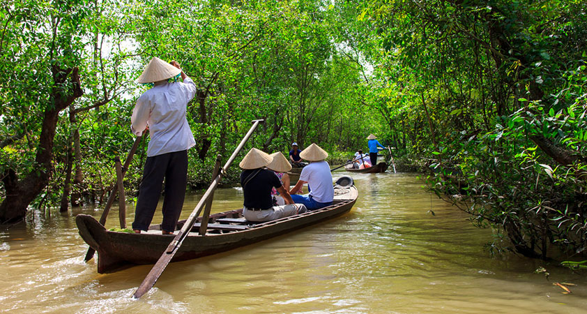 Take a boat for a cruise on the Mekong river 