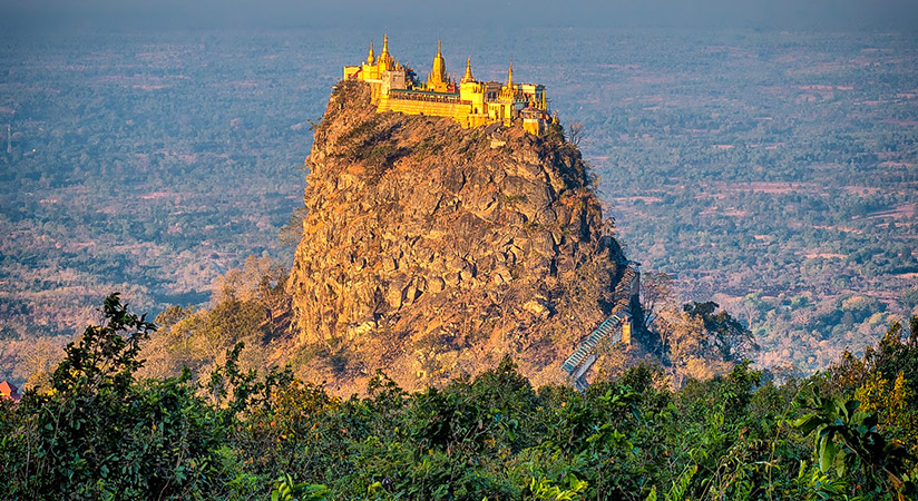 Visitors can even conquer Mt Popa by cycling