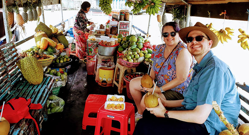 Experience the real floating market at Mekong Delta River