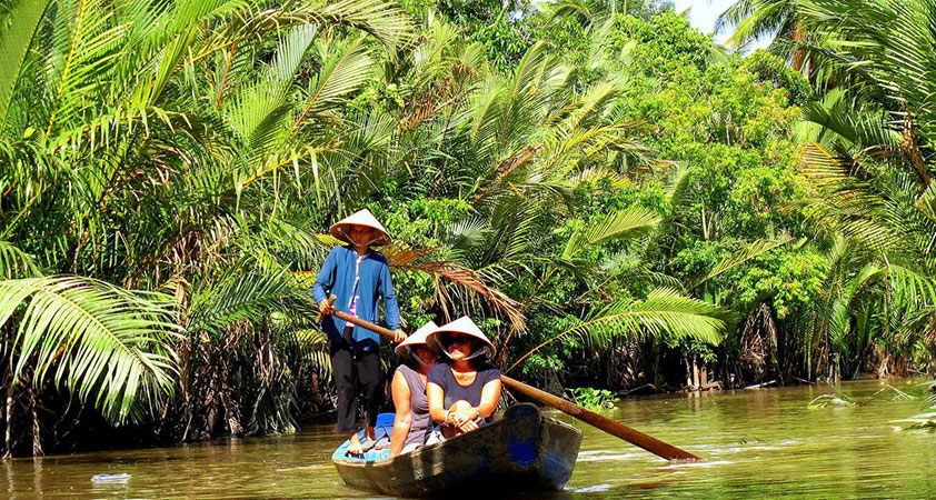 Take a boat for a cruise on the Mekong River