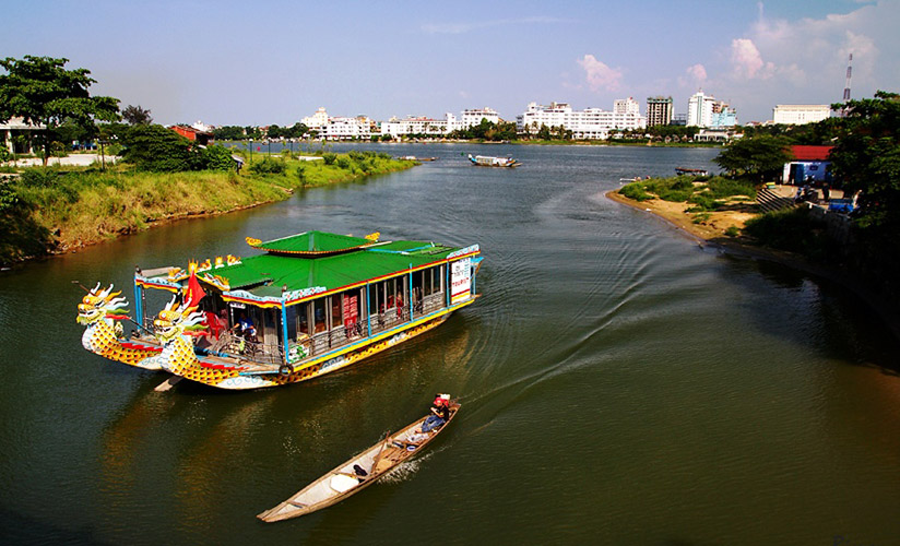Take a cruise along Huong River to enjoy the peaceful beauty here